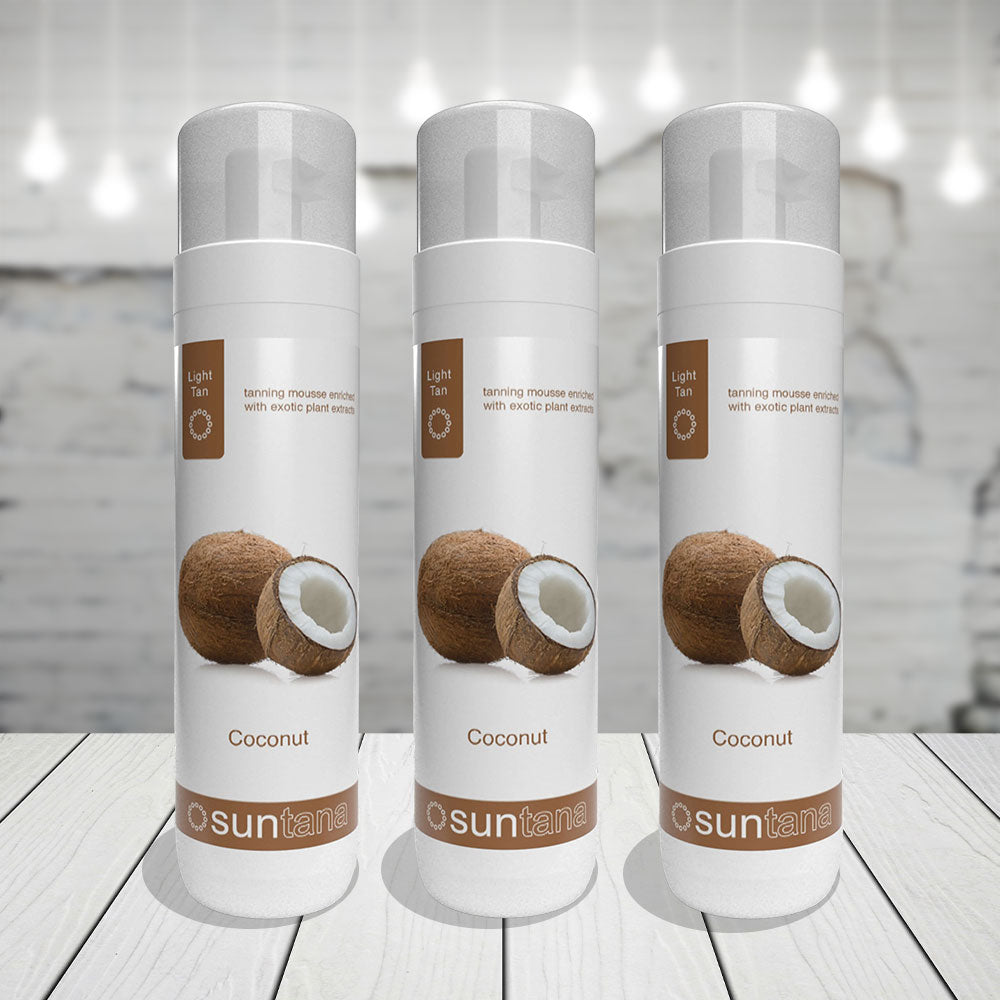 Three bottles of Suntana coconut tanning mousse.